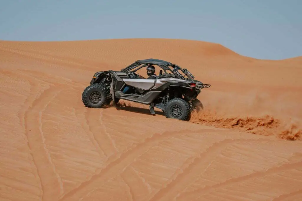 a person riding on an atv